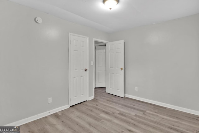 unfurnished bedroom featuring light hardwood / wood-style floors