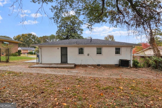 back of house with cooling unit