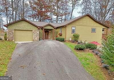 single story home with a garage