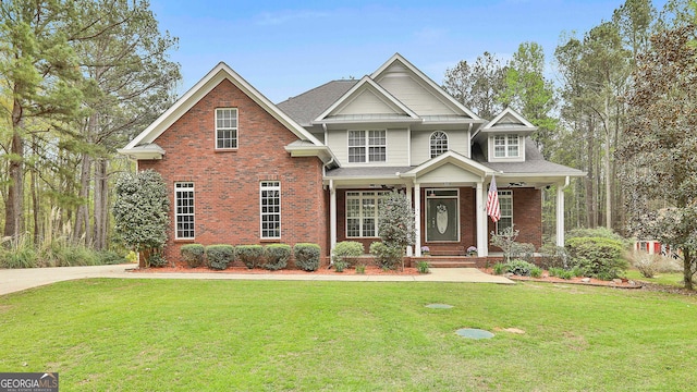 view of front of house featuring a porch and a front yard