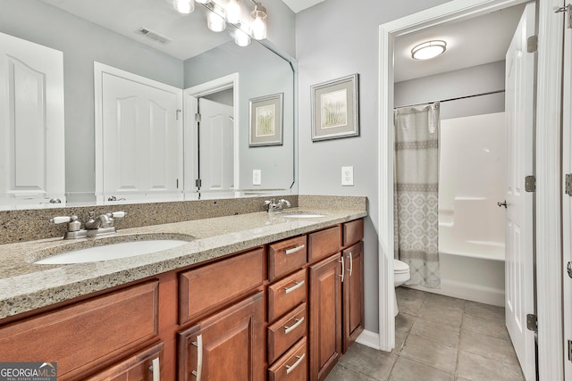 full bathroom featuring toilet, vanity, shower / bath combination with curtain, and tile patterned flooring