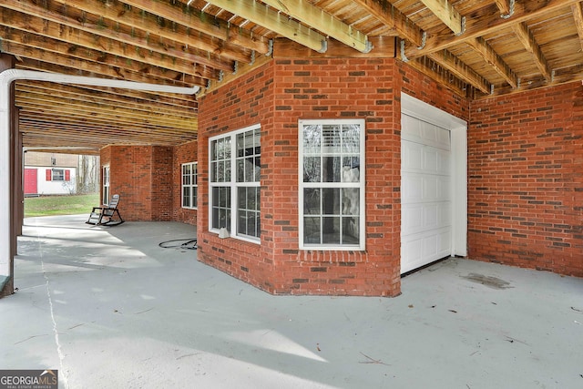 view of patio with a garage