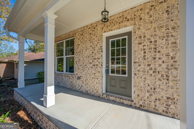 entrance to property with covered porch