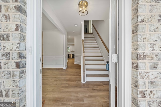 entrance foyer featuring hardwood / wood-style flooring