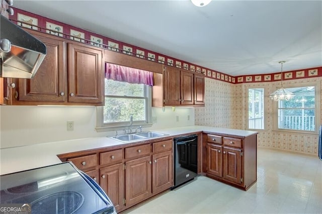 kitchen with dishwasher, a sink, range with electric stovetop, a peninsula, and wallpapered walls