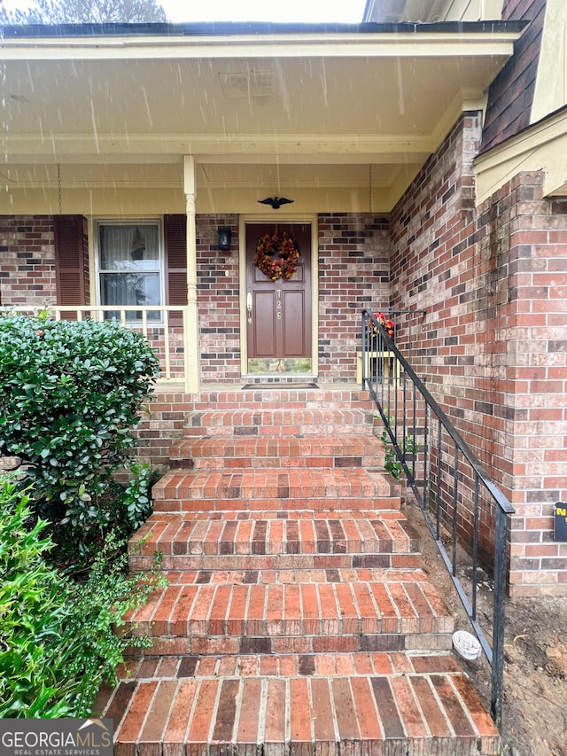 726 Victoria Cir, Dublin, GA 31021 - entrance to property featuring brick siding and covered porch