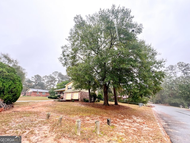 726 Victoria Cir, Dublin, GA 31021 - view of front facade featuring driveway and brick siding