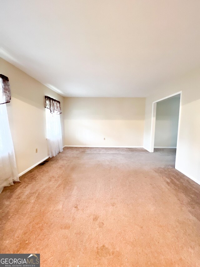 726 Victoria Cir, Dublin, GA 31021 - carpeted spare room featuring baseboards