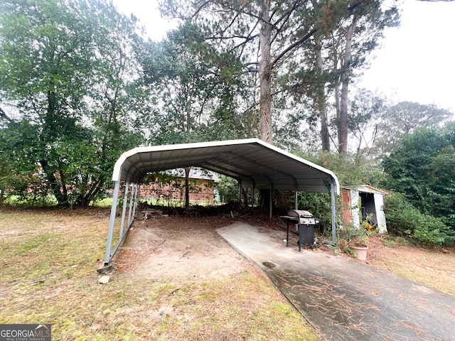 view of vehicle parking featuring a carport