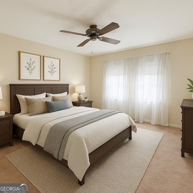 726 Victoria Cir, Dublin, GA 31021 - bedroom featuring light colored carpet, a ceiling fan, and baseboards