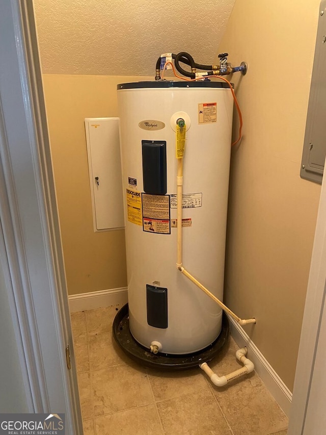 utilities featuring water heater and electric panel