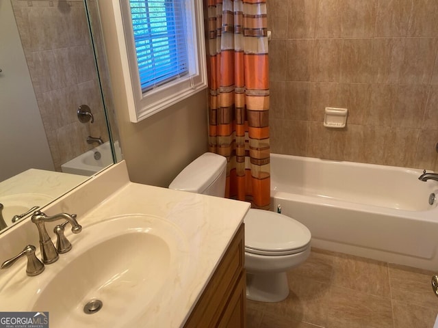 full bathroom featuring vanity, toilet, shower / bathtub combination with curtain, and tile patterned flooring