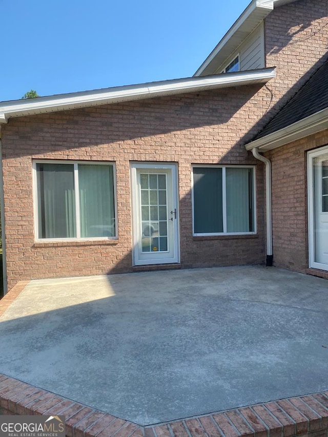 view of home's exterior featuring a patio area