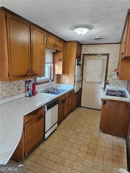 kitchen featuring sink and appliances with stainless steel finishes