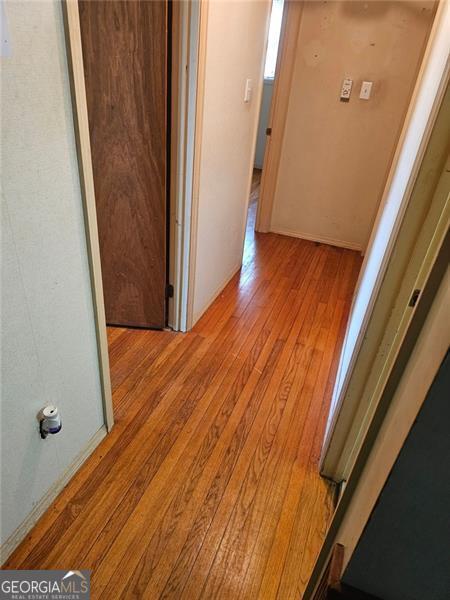 hall featuring light hardwood / wood-style floors