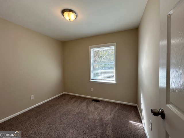 empty room featuring carpet