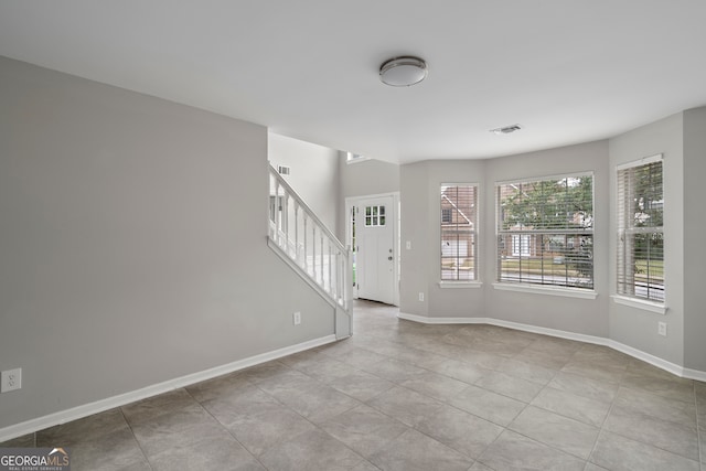 view of tiled spare room