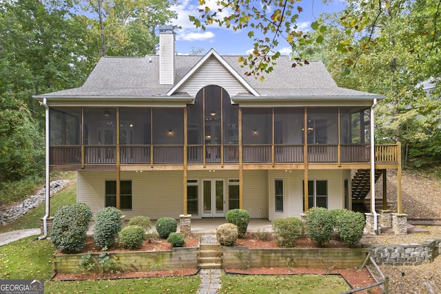 124 S Shore Dr, Fair Play, SC 29643 - rear view of house with a sunroom, a chimney, a patio, and stairs
