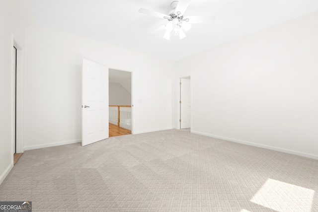 124 S Shore Dr, Fair Play, SC 29643 - unfurnished bedroom with carpet, baseboards, and a ceiling fan