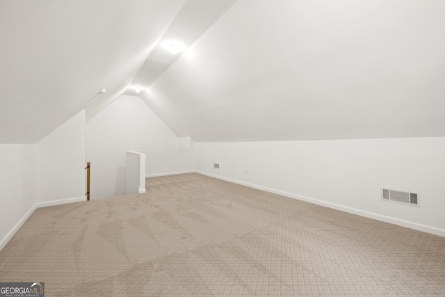 124 S Shore Dr, Fair Play, SC 29643 - additional living space with vaulted ceiling, baseboards, and carpet flooring