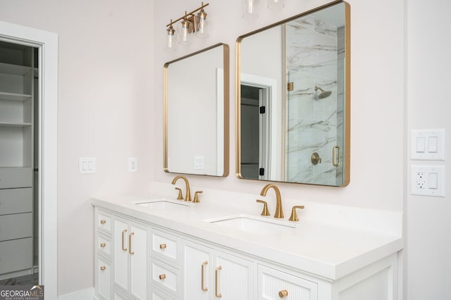 bathroom with vanity and an enclosed shower