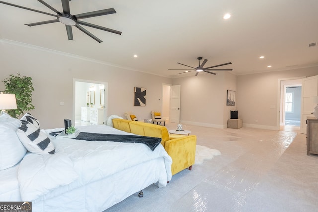 bedroom featuring ensuite bath, ornamental molding, and ceiling fan