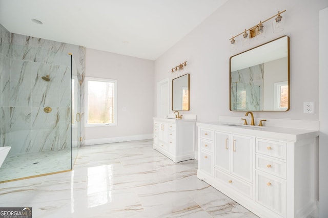 bathroom featuring vanity and a tile shower