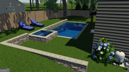 view of pool with a yard and a jacuzzi