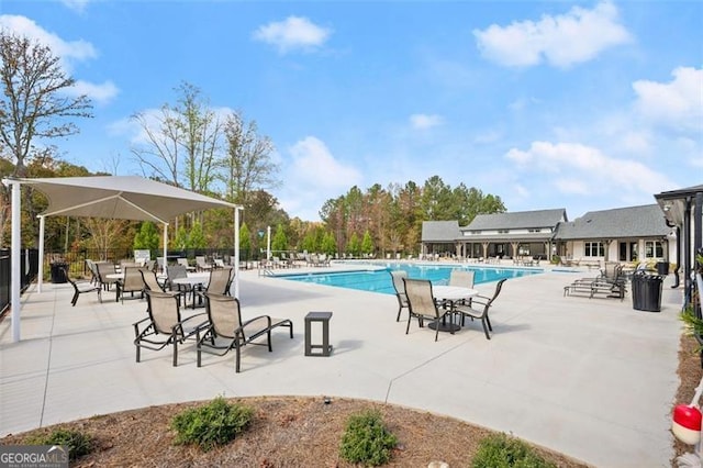 view of swimming pool featuring a patio