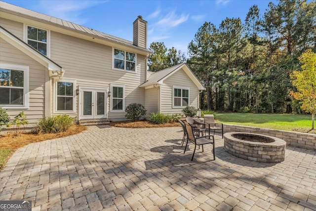 view of patio / terrace featuring a fire pit