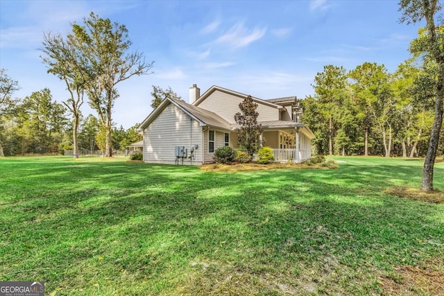 exterior space with a front lawn and covered porch