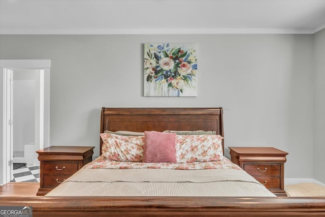 bedroom featuring crown molding