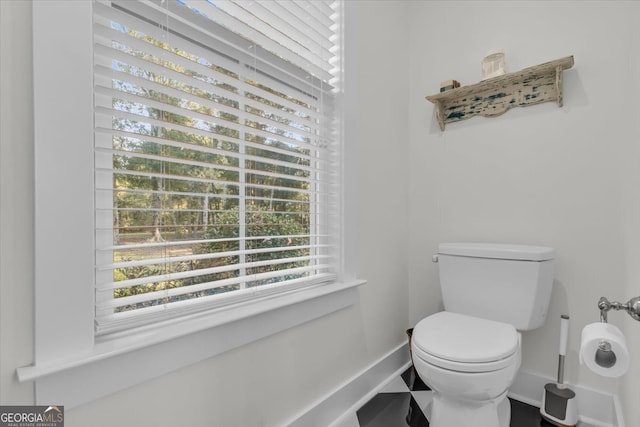 bathroom featuring toilet