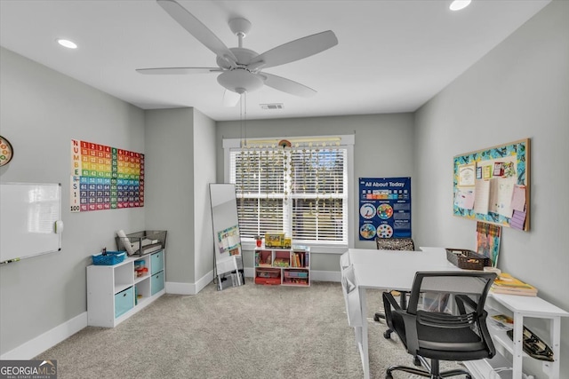 office area with carpet floors and ceiling fan