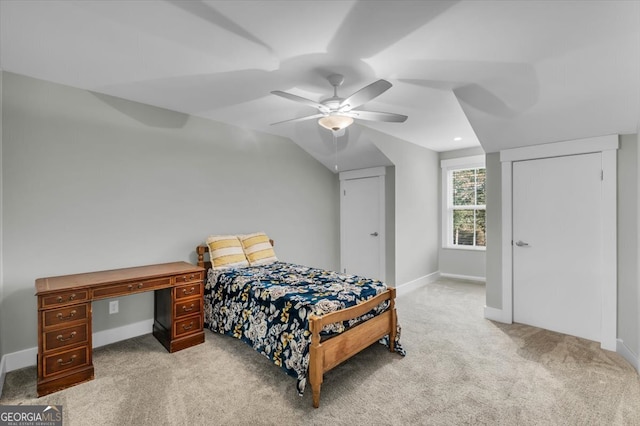 bedroom featuring light carpet and ceiling fan