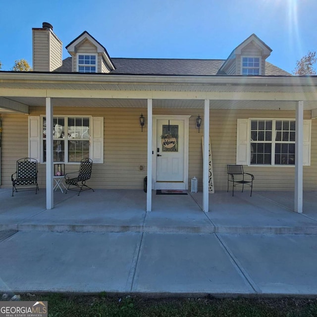 property entrance with a porch