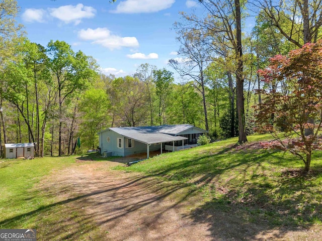 exterior space with a front lawn