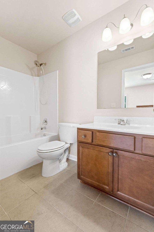 full bathroom featuring shower / tub combination, tile patterned floors, vanity, and toilet