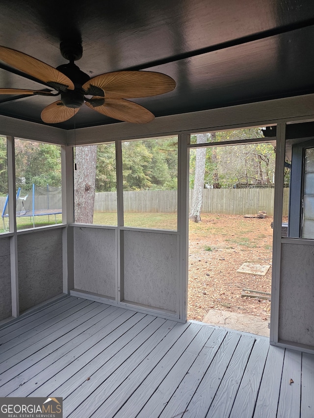 wooden deck with ceiling fan