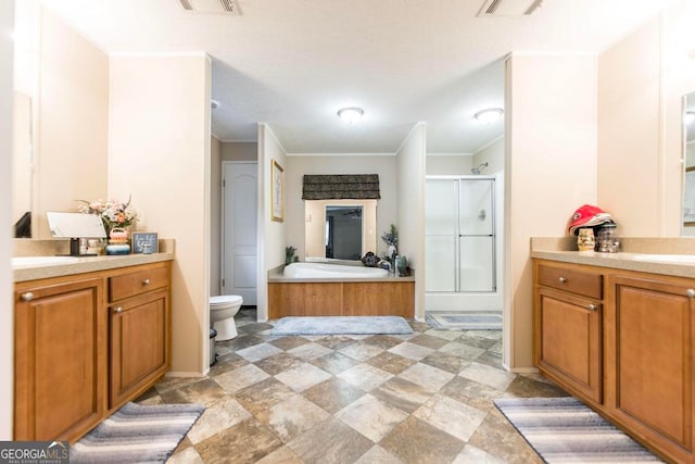 full bathroom featuring toilet, vanity, ornamental molding, and separate shower and tub