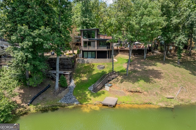 bird's eye view with a water view