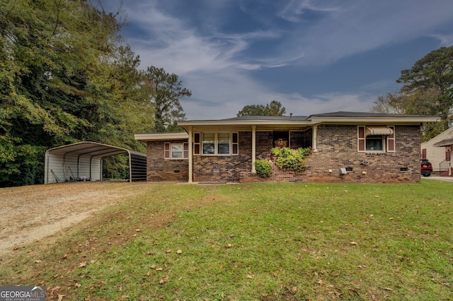 single story home with a front yard and a carport