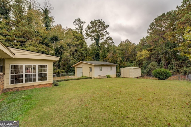 view of yard with a storage shed