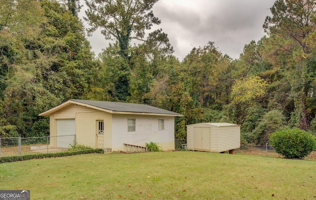 view of outdoor structure featuring a yard