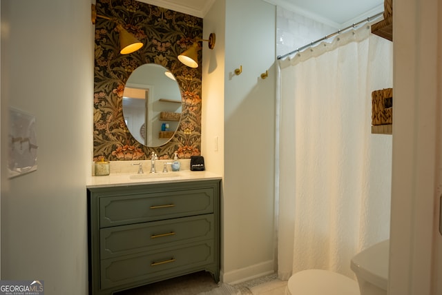 bathroom featuring toilet, walk in shower, vanity, and ornamental molding