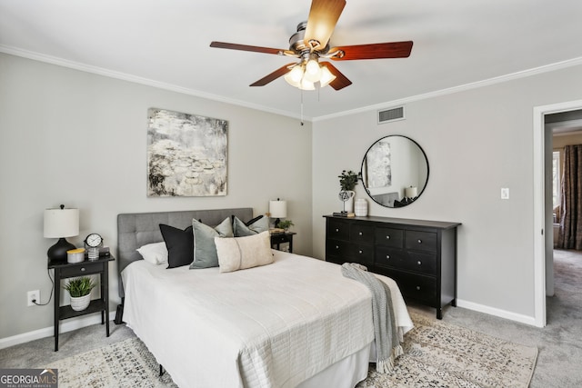 bedroom featuring ceiling fan, crown molding, and light carpet