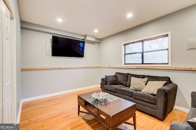 living room with light hardwood / wood-style floors