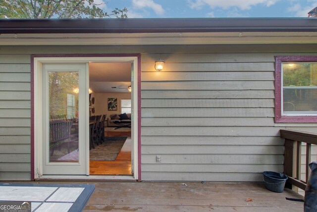 doorway to property with a deck