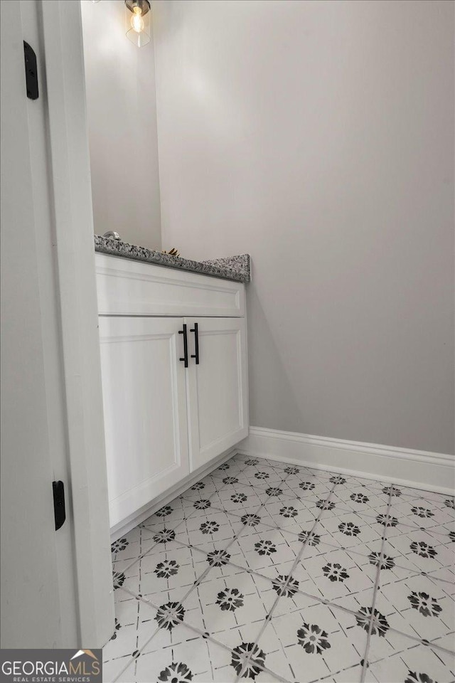 319 S Madison Ave, Monroe, GA 30655 - bathroom featuring baseboards