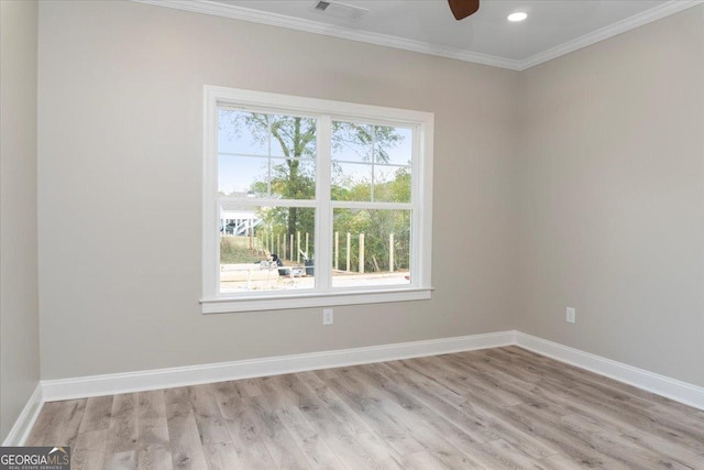 319 S Madison Ave, Monroe, GA 30655 - spare room with ornamental molding, light wood-style flooring, baseboards, ceiling fan, and recessed lighting